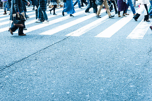 istock People who walk the crosswalk 590176468