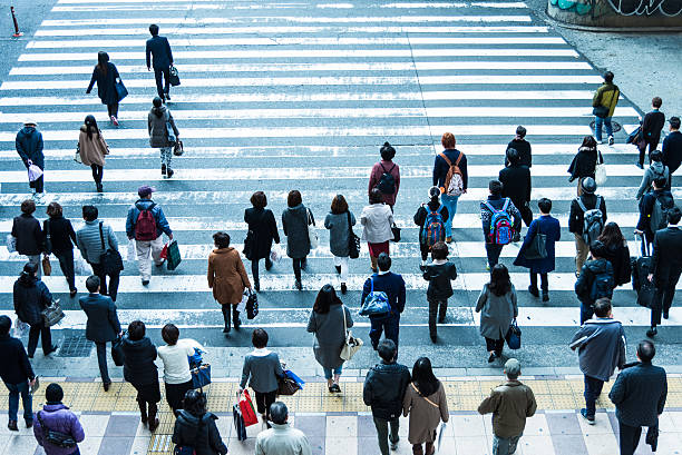 istock People who walk the crosswalk 590177082
