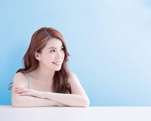 istock beauty woman look you happily 590177376