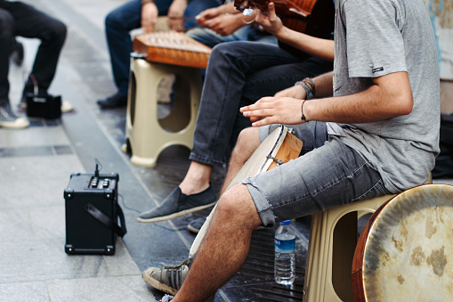 Izmir, Turkey - Agust 07, 2016:Street performers playing musical ınstrument in Izmir.