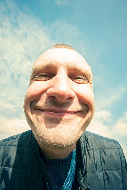 istock Don't worry-be happy! Delighted funny man closeup portrait. 590177554