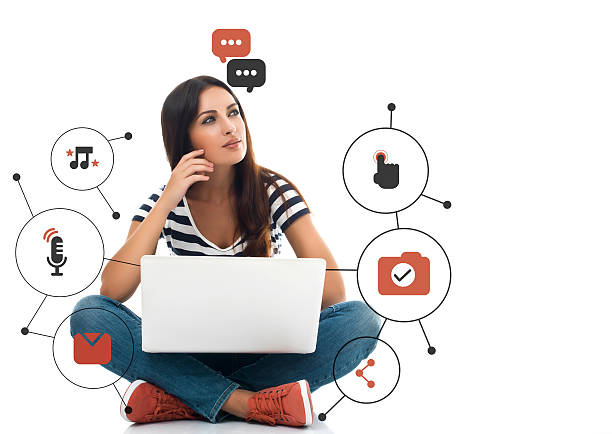 istock Woman using laptop with communication icon set 590177760