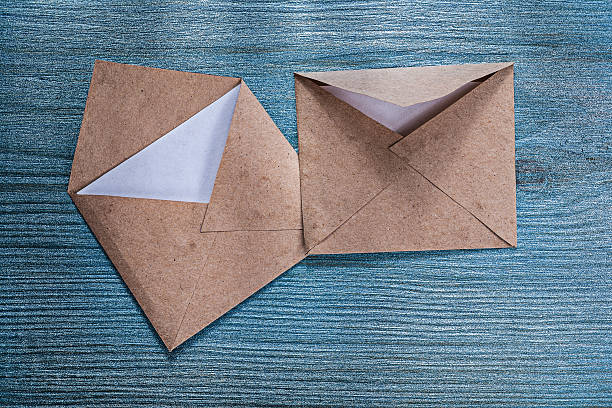 istock Retro post envelopes letter on wooden board 590179946