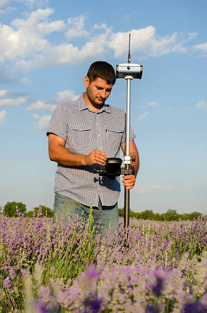 istock Geodesy measurement in a lavender field 590180232
