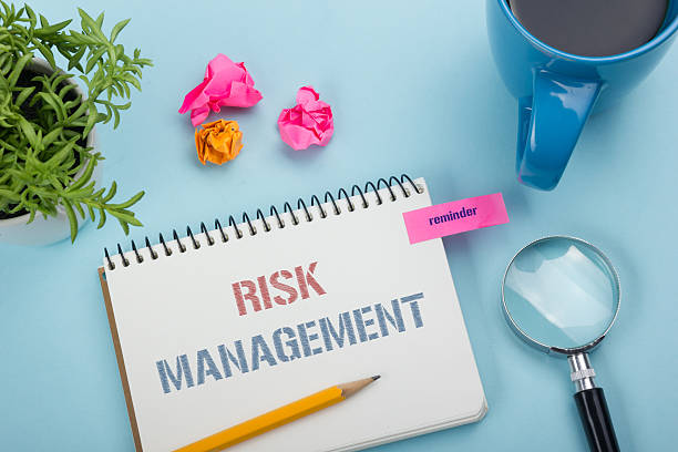 istock Risk Management concept. Notepad with message, pencil and flower, coffe 590240562