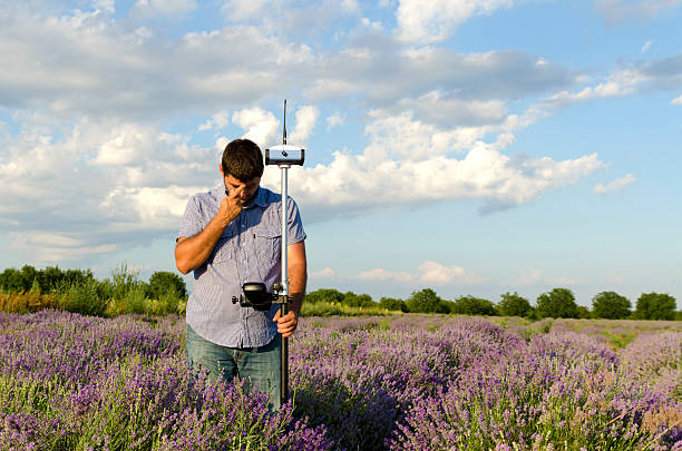 istock Lavender field and surveyor 590240962