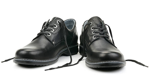 istock Black shoes isolated on white 590241468