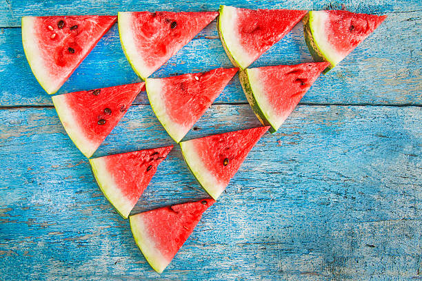istock on a blue background flat triangles of watermelon 590246560