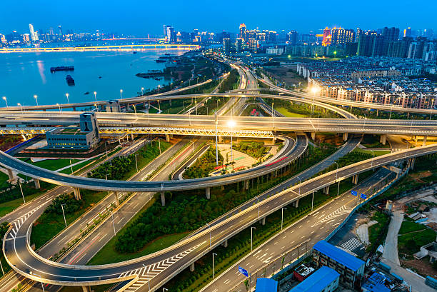 istock City-highway vehicles in the dusk 590248396