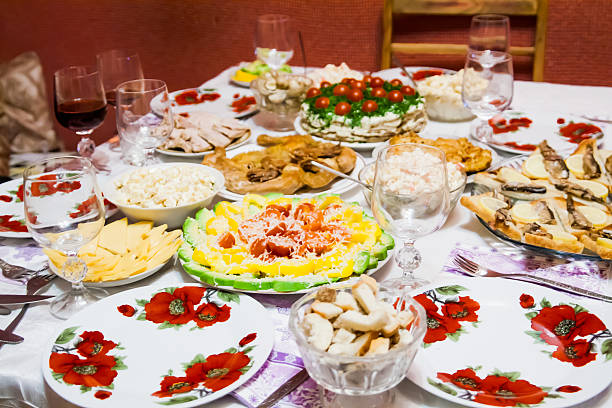 istock holiday table with dishes, with different dishes, salads 590248764