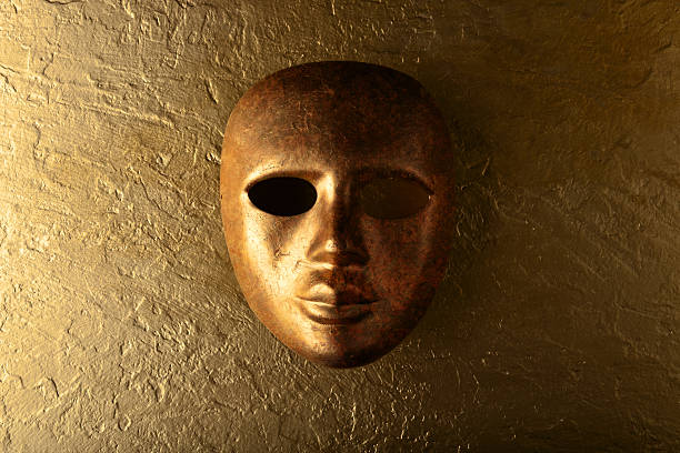 istock carnival mask on a golden background 590249100