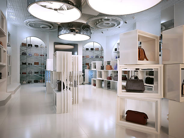 Luxury store interior design art deco style with hints Luxury store interior design art deco style with hints of Contemporary. Interior white store with lots of shelves. Shop for the sale of bags on the shelves of handbags. 3D render. boutique stock pictures, royalty-free photos & images