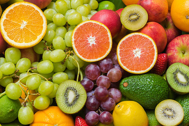 istock Fresh fruits and vegetables background 590250234