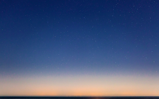 Cielo estrellado y la costa de Sicilia photo