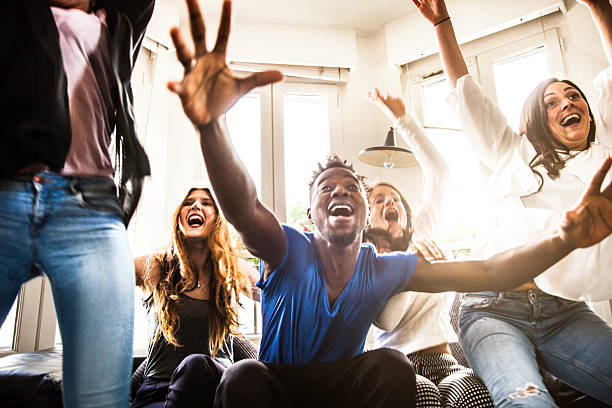istock Watching the match on TV with friends 590255714