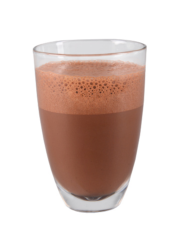 Isolated shot of hot chocolate in glass.
