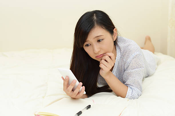 istock Woman with a smart phone 590258172