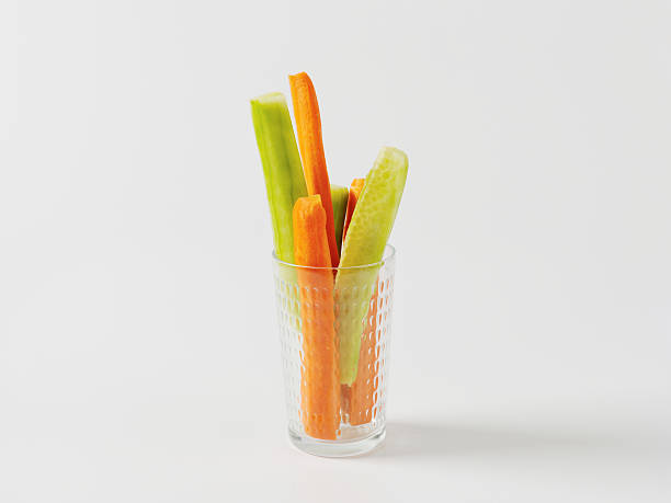 istock Cucumber and carrot sticks 590260040