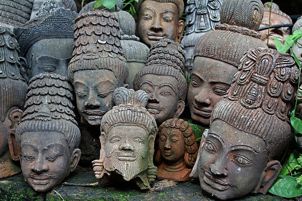 istock old terracotta Buddah heads 590264188