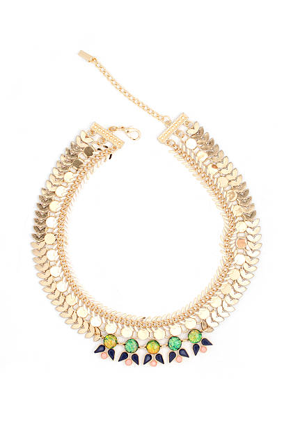 istock gold necklace with colored stones isolated on white 590267988