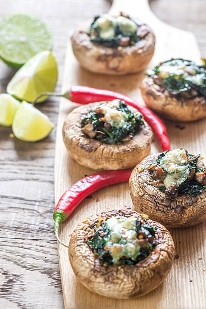 istock Baked mushrooms stuffed with spinach and cheese 590268228