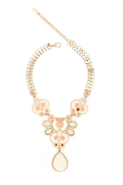 istock gold necklace with gems isolated on white 590268642