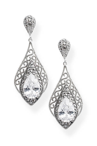 istock silver earrings with diamond isolated on white 590269896