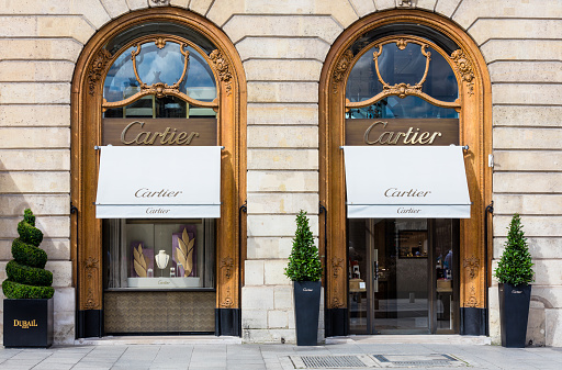 Paris, France - July 02, 2016: Cartier shop in place Vendome in Paris. The company with its headquarters in Paris is now a wholly owned subsidiary of Compagnie Financiaire Richemont SA