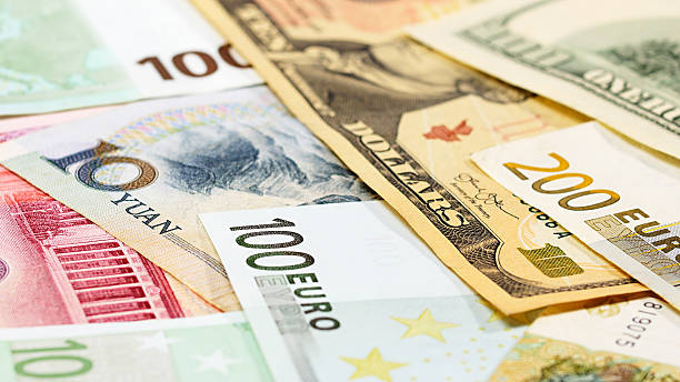 istock Main word currency Yuan, US Dollar and Euro bank notes 590270576