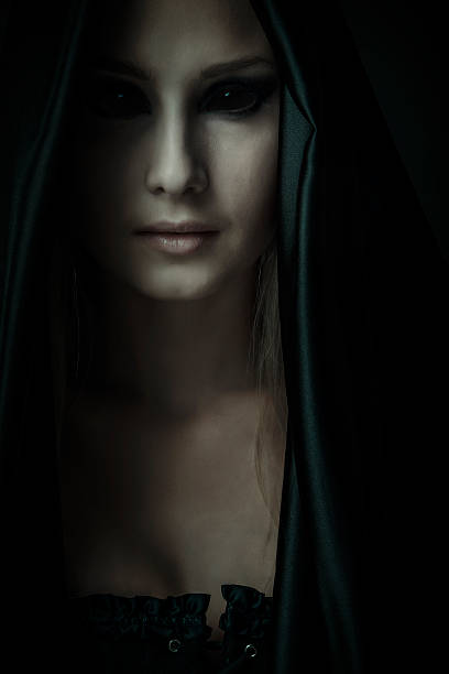 Demon Dark portrait of a possessed woman. Halloween theme.  vampire woman stock pictures, royalty-free photos & images