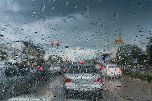 istock Raindrops on glass car,Please be careful when driving in 590273200