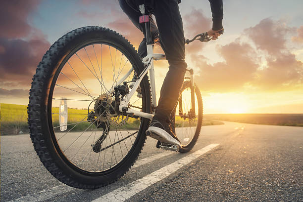 istock Ride on bike on the road 590273912