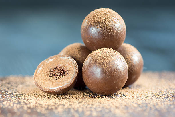 istock Assorted dark chocolate truffles with cocoa powder 590274992