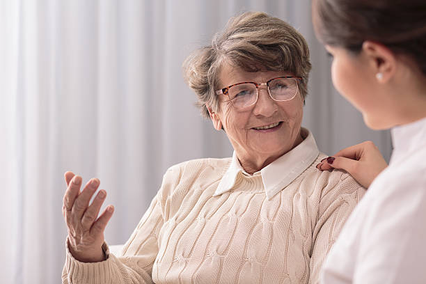 istock Lady and caregiver 590276622