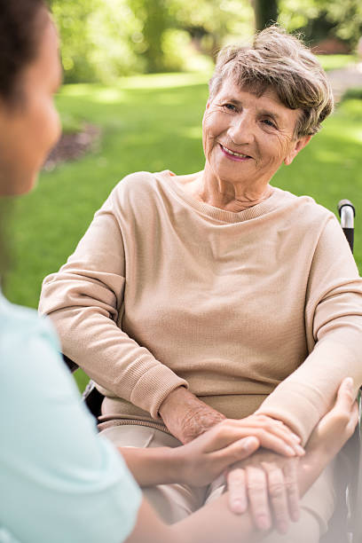 istock Disabled positive elderly woman 590277550
