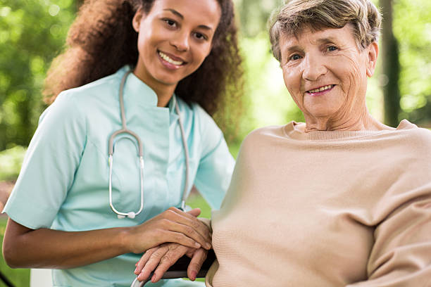istock Doctor and patient on wheelchair 590277552