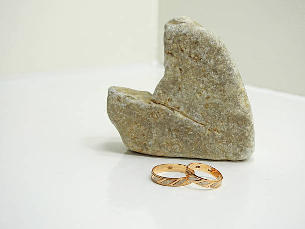istock Hearth rock with two golden rings 590280574