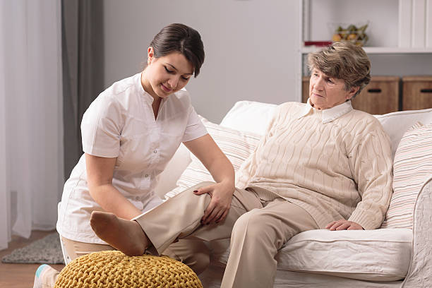 istock Woman with painful knee 590282484