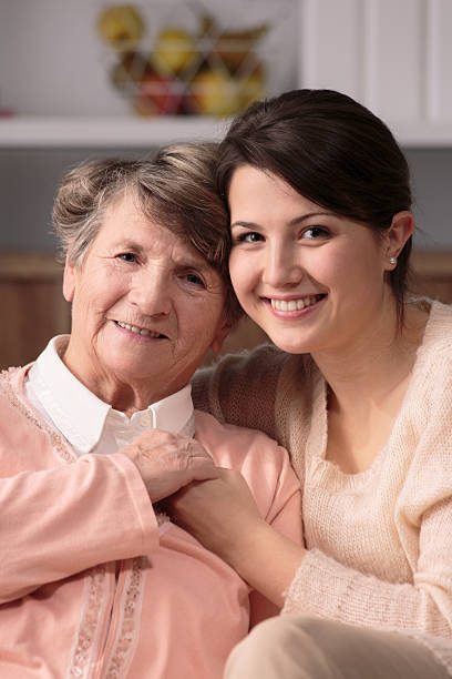 istock Caregiver and patient 590282648