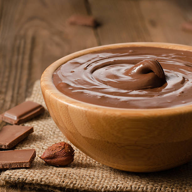 istock Sweet chocolate sauce in a bowl 590284396