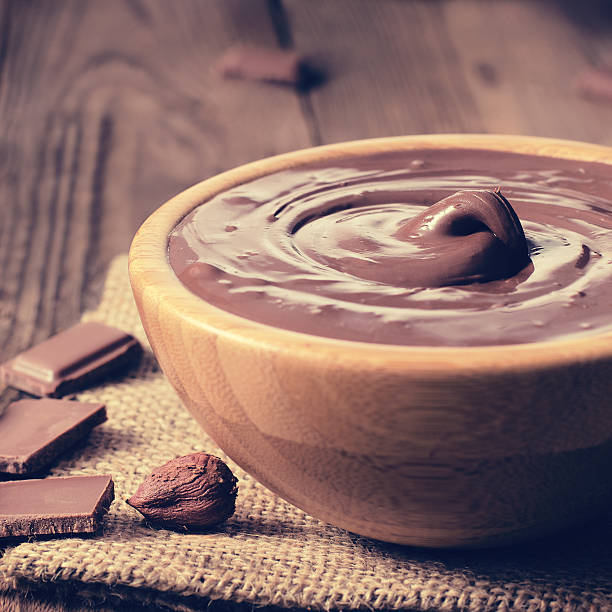 istock Sweet chocolate sauce in a bowl 590284428