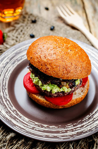 istock black bean burger with mashed avocado, caramelized onions and tomatoes 590284714