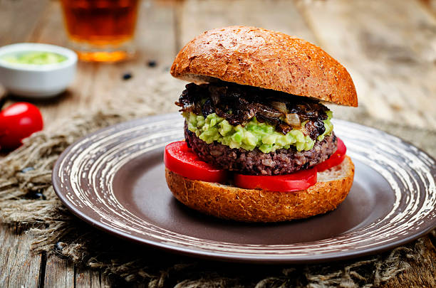 istock black bean burger with mashed avocado, caramelized onions and tomatoes 590284742