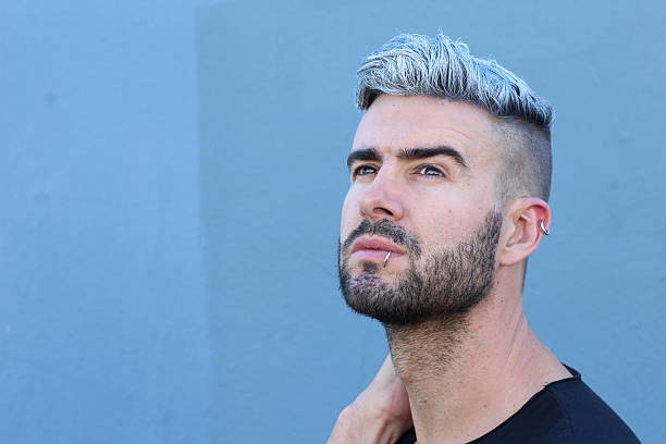istock Man with undercut artificially colored hairstyle 590285164