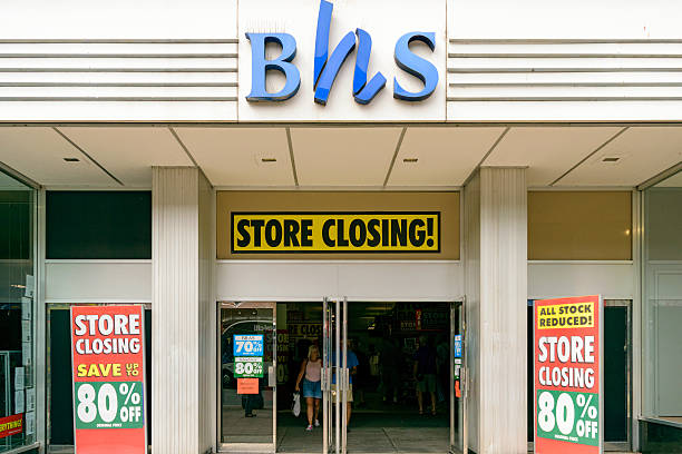 Store closing signs in front of British Home Stores BHS stock photo