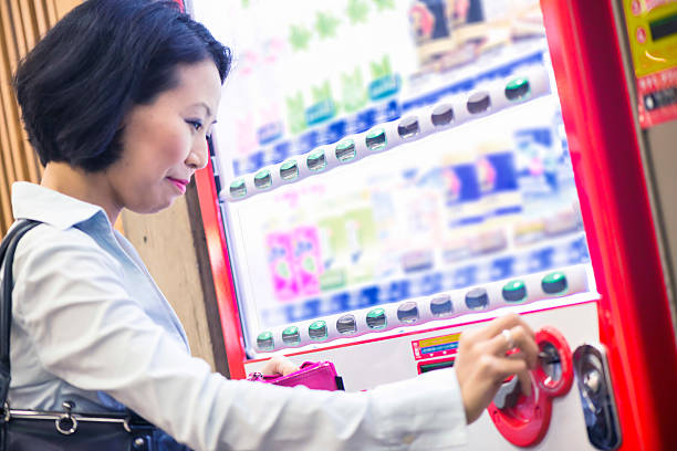 istock Japanese women in front of vending machine 590286300