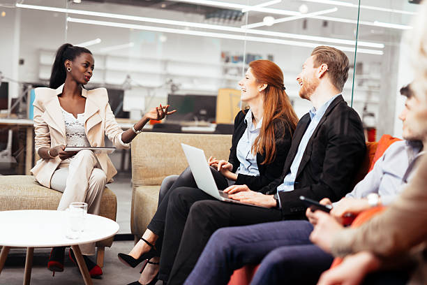istock Business people conversation. Technology at hand 590294856