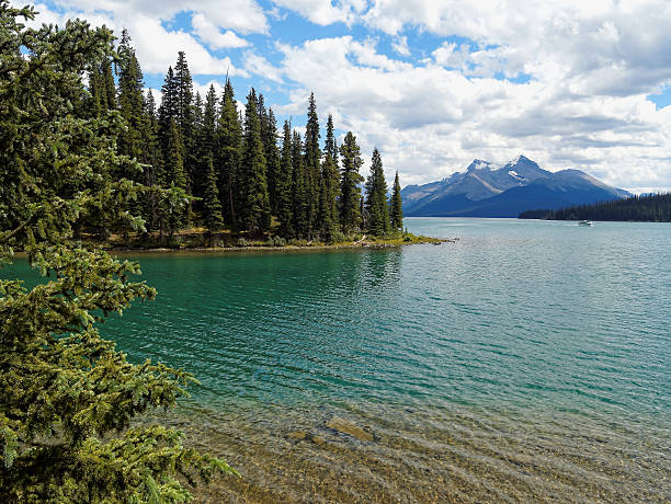 istock Turquoise Maligne Lake with Mountain Backdrop 590297436