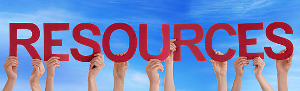 istock Many People Hands Holding Red Straight Word Resources Blue Sky 590297916