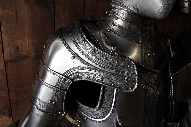 Armor Shoulder The detailed shoulder of a suit of armor at the Styrian Armory.  armory photos stock pictures, royalty-free photos & images